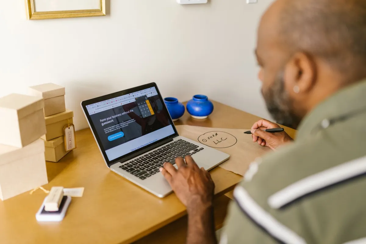 Laptop on a desk for reviewing an HVAC website design